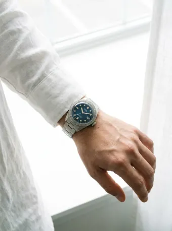 Steel dive watch — Metal and glass, the two things AI usually ruins